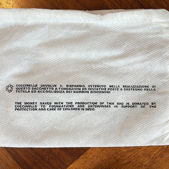 VINTAGE NEVER WORN (WITH TAGS) COCCINELLE BLACK LEATHER WRISTLET - Picture 5 of 8